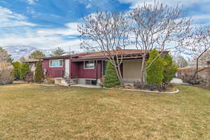 Rear view of house with a mountain view