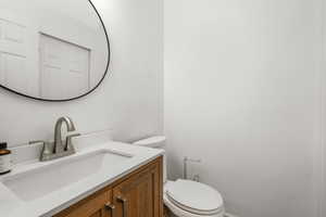 Bathroom featuring toilet and vanity