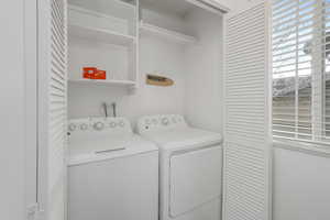 Clothes washing area with laundry area and separate washer and dryer