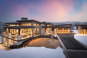 Exterior space featuring an attached garage and driveway