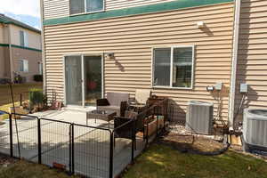 View of patio / terrace with fence and central air condition unit