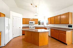 Large Kitchen with Ample Cabinets and Quartz Countertops