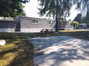 Exterior space featuring a front yard