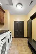 Laundry room with storage closet