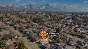 Drone / aerial view featuring a residential view and a mountain view