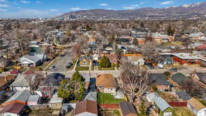 Drone / aerial view featuring a mountain view and a residential view