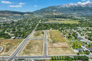 Aerial overview of property's location with a mountainous background