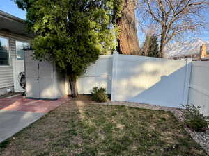 View of yard featuring a patio area and a fenced backyard