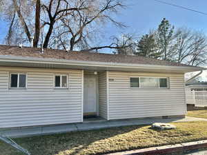 View of front facade with crawl space