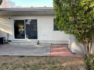 View of patio featuring entry steps and central AC