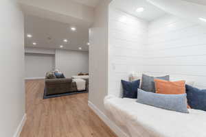 Adorable nook under the stairs with access to the main basement living room.