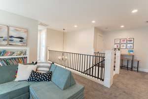 Loft living at the top of the stairs.