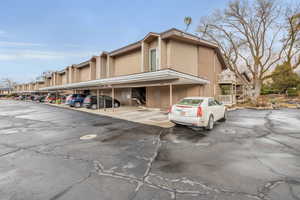 Exterior space featuring covered parking
