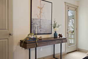 Room details with carpet and baseboards