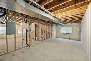 Below grade area featuring electric panel