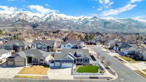 Exterior space featuring a residential view and a mountain view