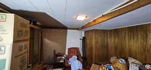 Interior space with concrete block wall and wooden walls