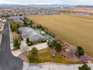 Birds eye view of property with a mountain view