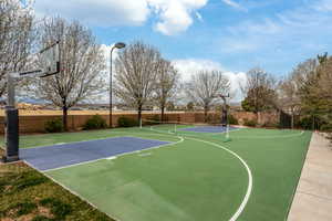 View of sport court with community basketball court and fence