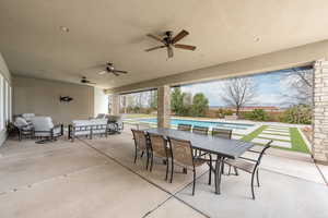 View of patio / terrace featuring ceiling fan, an outdoor hangout area, a fenced in pool, and outdoor dining space