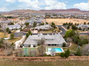 Birds eye view of property featuring a residential view and a mountain view