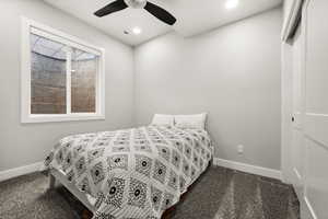 Carpeted bedroom with a ceiling fan, recessed lighting, visible vents, and baseboards