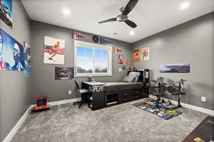 Bedroom with baseboards, carpet flooring, and recessed lighting