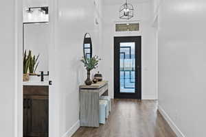 Foyer with wood finished floors