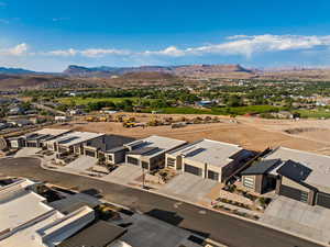 Aerial perspective of suburban area with mountains