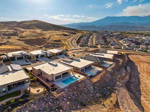 Aerial view of residential area with a mountainous background