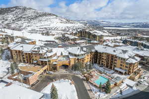 Snowy aerial view with a mountain view