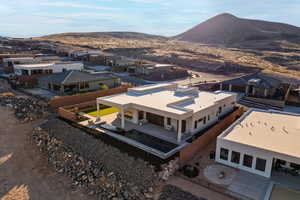 Drone / aerial view with a residential view and a mountain view