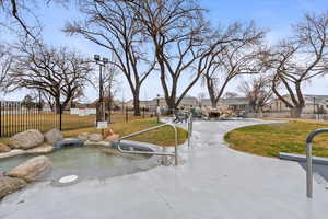 Surrounding community featuring a yard, a residential view, and fence