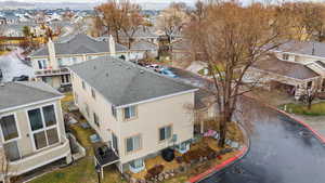 Birds eye view of property with a residential view