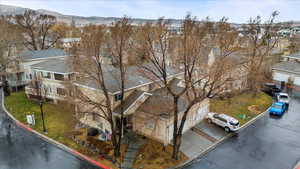 Birds eye view of property featuring a residential view and a mountain view