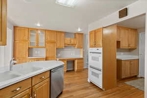 Kitchen with double ovens and tons of storage