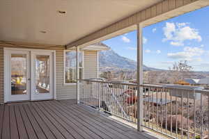 Covered deck with a valley view