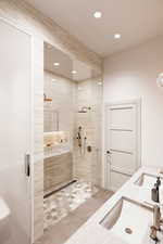 Rendering Full bath featuring recessed lighting, tile patterned flooring, vanity, and a walk in shower