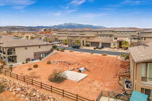 Property view of mountains with a residential view