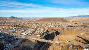 Birds eye view of property featuring a mountain view