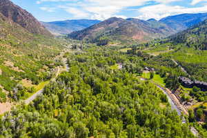 Aerial view featuring a mountain view