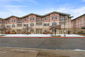 View of front of property featuring stucco siding