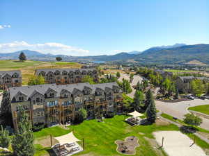 Aerial view featuring a residential view and a mountain view