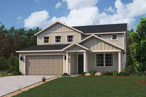 View of front of house with an attached garage, concrete driveway, board and batten siding, and a front yard