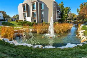 View of community with a water view