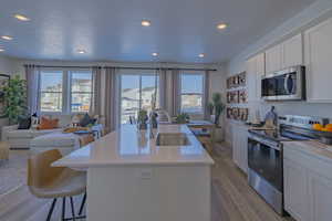 *Photo of furnished model home with similar options & finishes*