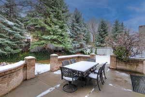 View of patio featuring outdoor dining space and fence private yard