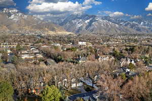 Property view of mountains featuring a residential view