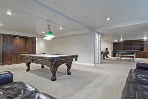 Game room with recessed lighting, billiards, baseboards, and light colored carpet