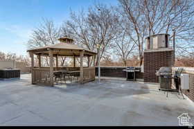 View of patio / terrace featuring area for grilling and a gazebo